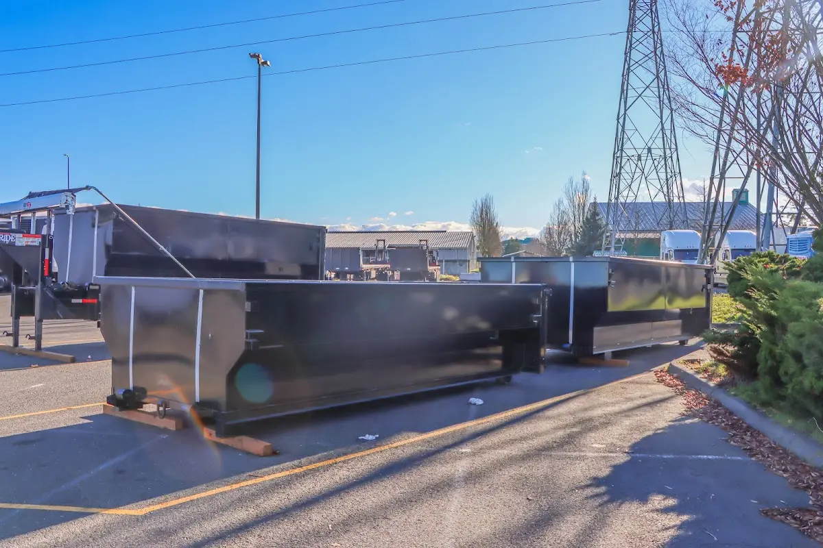 Roll-off dumpster ready for waste disposal at job site for 2 Yard Dumpster Rental in Parlier